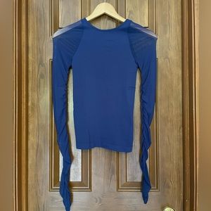 Free People intimately long sleeved top with sheer mesh sleeves